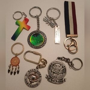 #697.  7 Piece Assorted Keychain Bundle